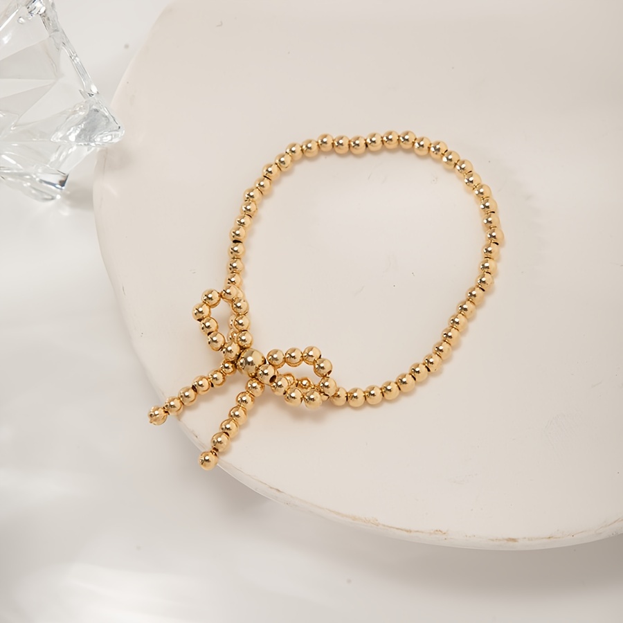 Women's Beaded Bracelet with Bow & Personalized Design